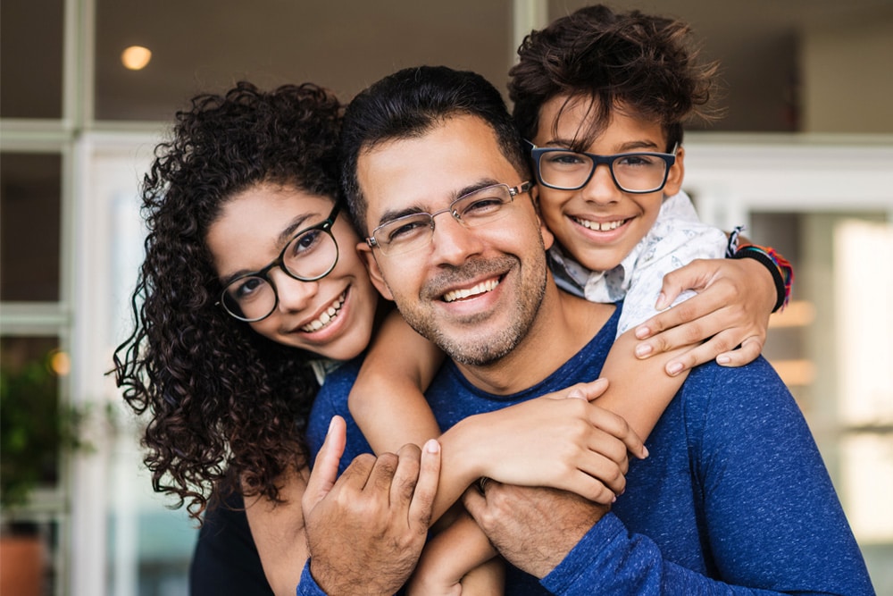 Happy family at Dr. B Smiles Orthodontics representing trusted orthodontic care for all ages in Wappingers Falls, NY